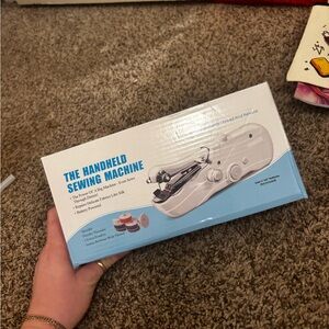 Brand new! Handheld Sewing Machine in White and Blue